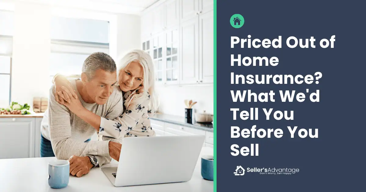 Happy middle aged couple drinking coffee at the kitchen island, reviewing home insurance quotes on a laptop.